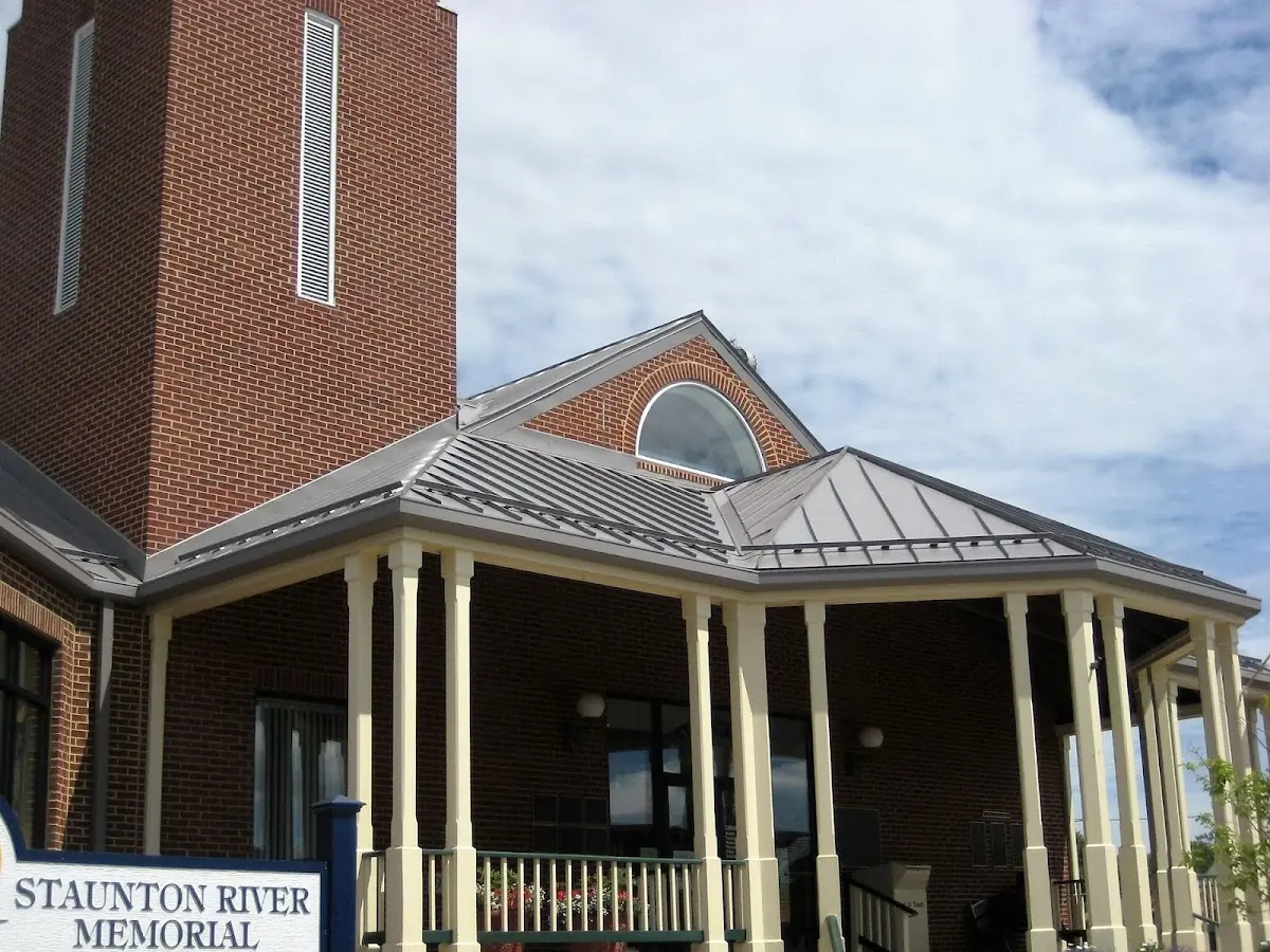Skilled roofing craftsmen working on a residential roof in Umw Campus